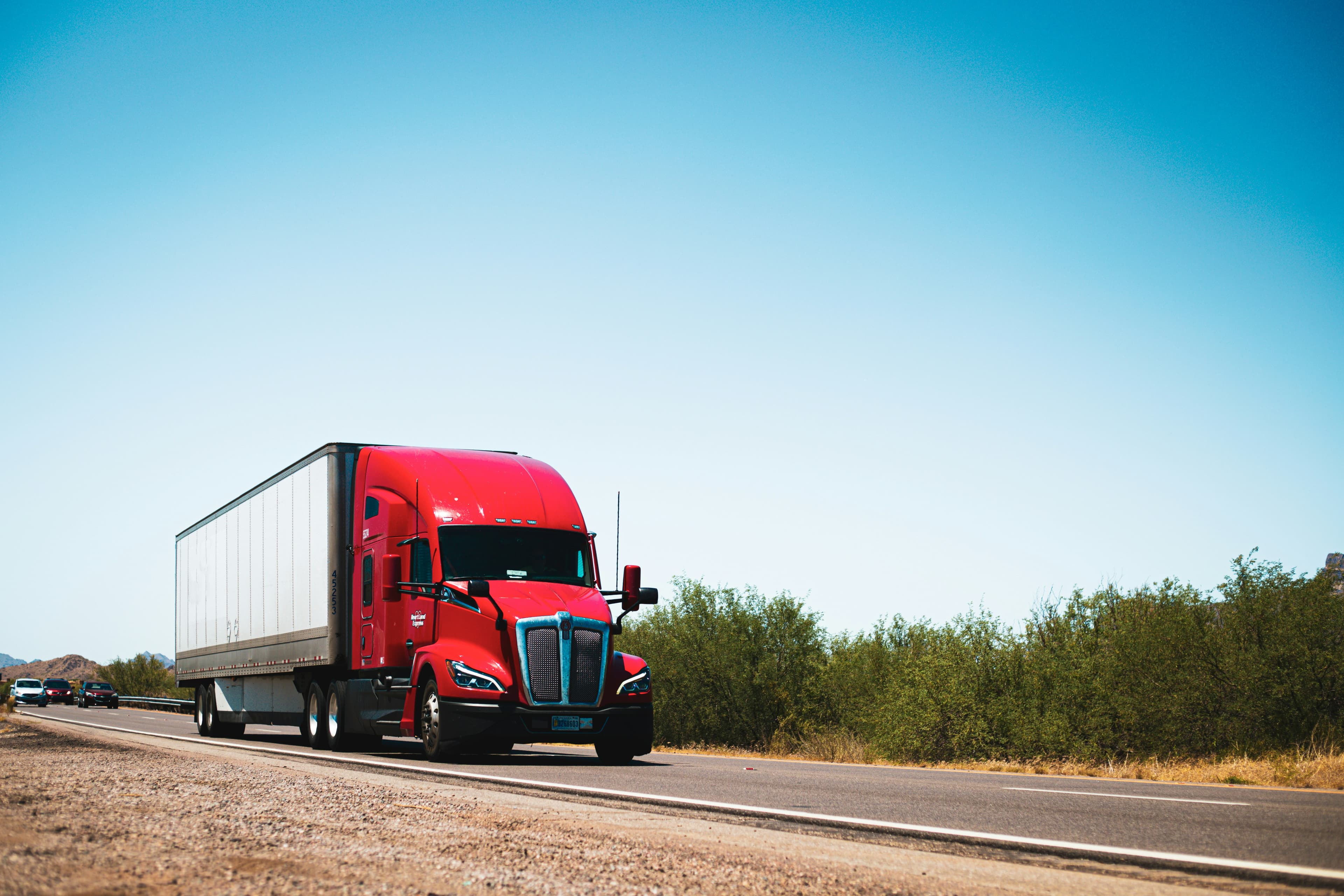 Commercial freight truck on a regional lane.